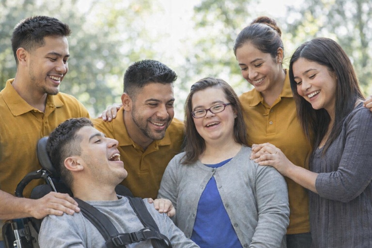 Care staff supporting adults in a community setting